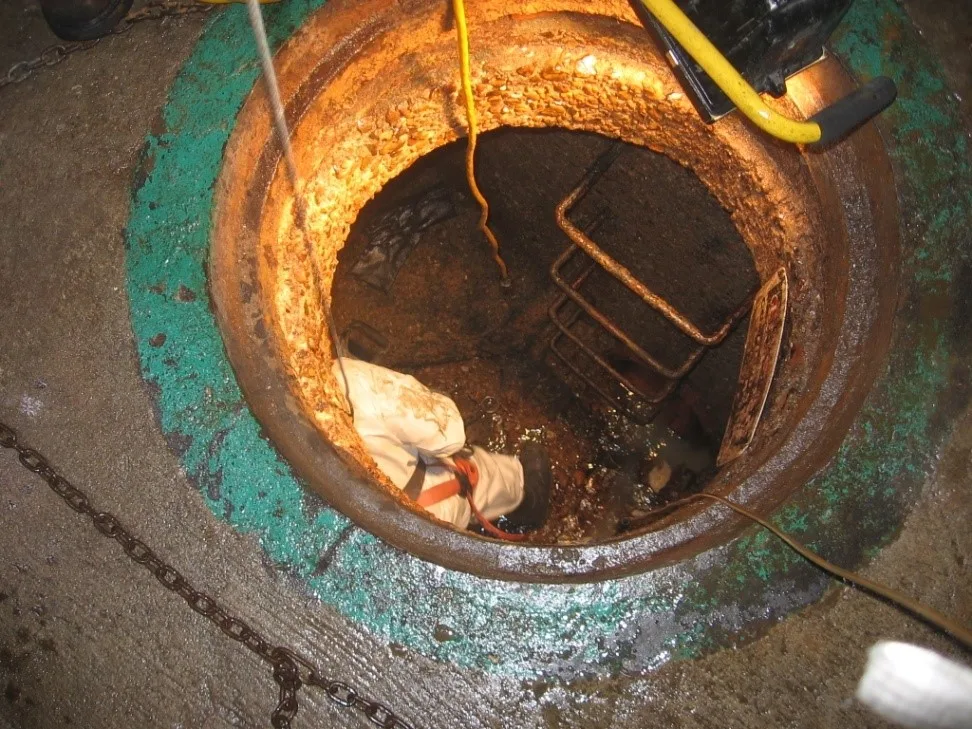 Industrial plumbing. manhole. pipe lining manhole