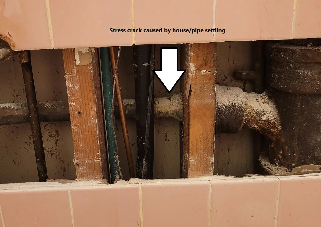 stress crack. damaged plumbing pipe.